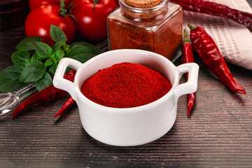 Spicy dry paprika powder in the bowl