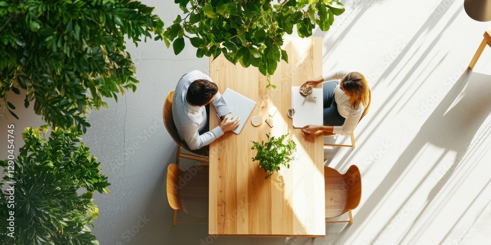 Aufkleber green workspace design sleek wooden table in biophilic shared office with indoor plants - adaptive w