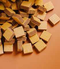 Wafers scattered on a warm-toned background in a cozy setting