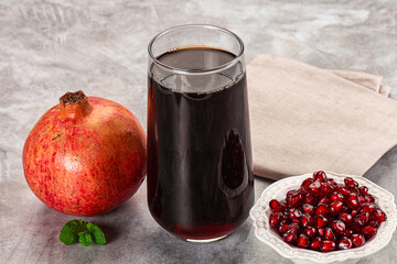 Sweet fresh pomegranate juice with fruit