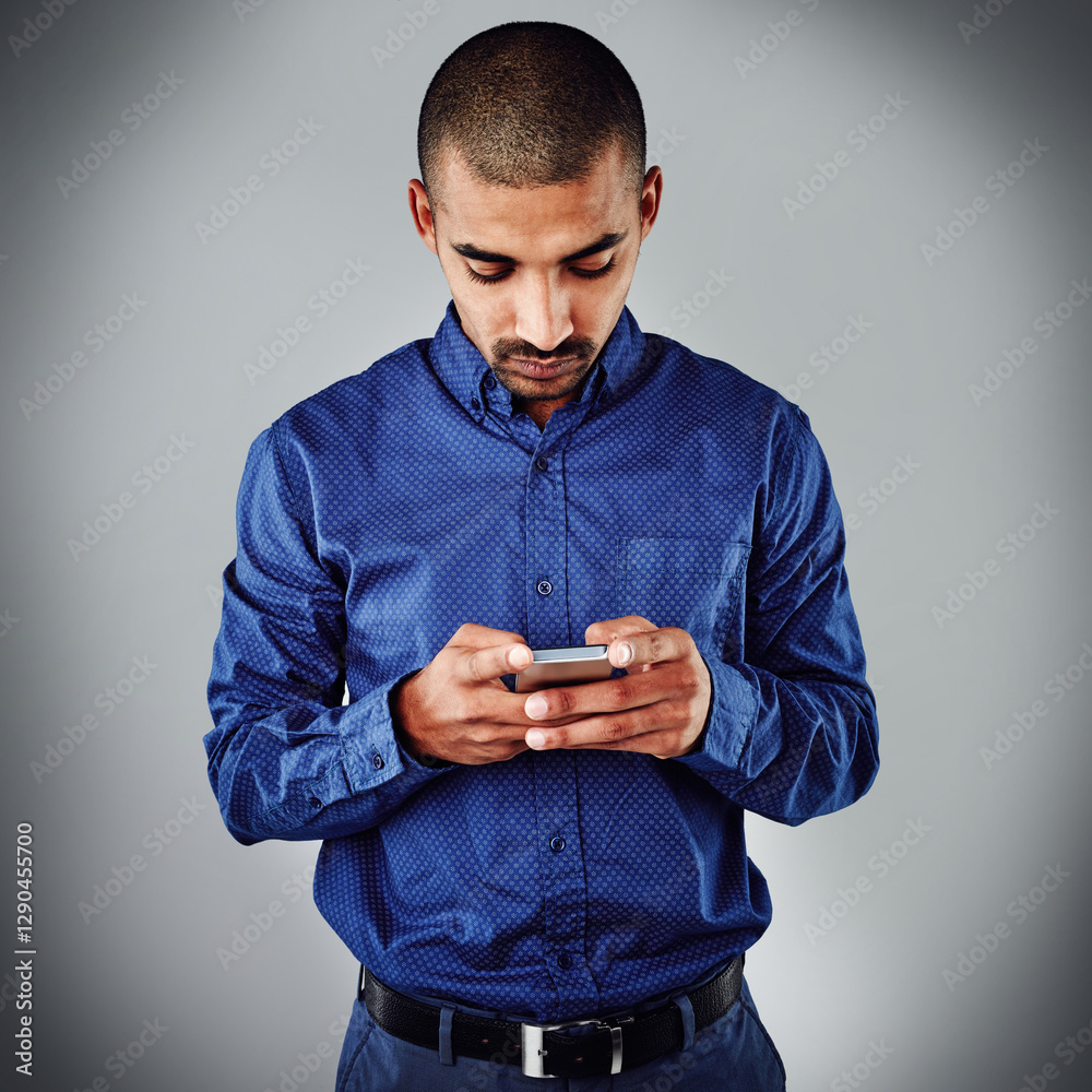 Poster studio, businessman and online with smartphone for chat, message communication and typing for contac