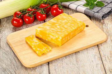 Marble yellow cheese with slices