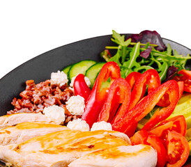 Colorful salad bowl with grilled chicken, vegetables, and grains