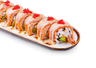 Sushi rolls arranged on a plate with colorful toppings