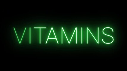 Flickering neon green Vitamins sign animated on black background. - Powered by Adobe