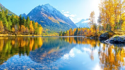 Fototapeta premium Autumnal lake reflecting snowy mountain, golden trees (1)