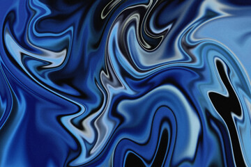 A mesmerizing, abstract pattern of swirling blues and blacks, resembling a fluid, marble-like texture.