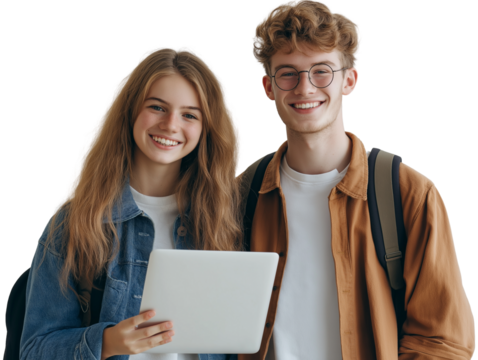 two students smiling and holding laptop.