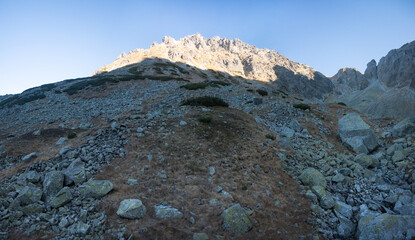 Travel along a marked mountain trail in the High Tatras. Landscape of high mountains.
