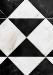 Close-up of a black and white tiled floor. the tiles are arranged in a diamond shape, with each tile having a different color - black, white, and light grey.