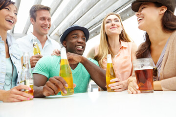 Beer, diversity and group of friends at pub together for hang our, reunion or social gathering....