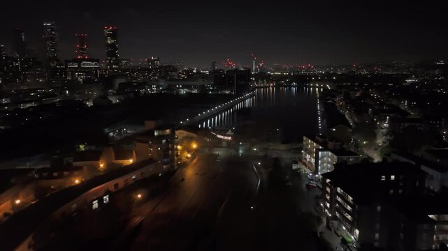 Aerial view toward the Millwall outer dock, night in Isle of Dogs, London, UK