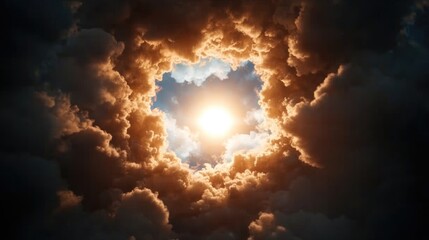 Dramatic sky with sun breaking through dark clouds