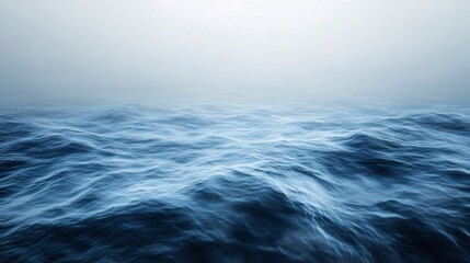 Fototapeta premium Beautiful ocean waves are presented under a vast and hazy sky