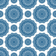 floral mandala motif seamless pattern in blue and white color for wallpaper and tile
