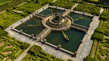 Aerial view of a beautiful fountain inside a decorated garden of a beautiful villa with park. It is located in Bagnaia, In the province of Viterbo, Italy.