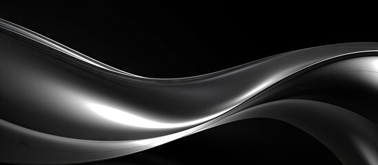 Abstract flowing waves in shades of black and silver with a smooth metallic finish creating a dynamic and elegant background design.