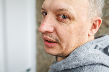 face of angry person dissatisfied with life and everything that happens. man is grimacing