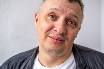 face of angry person dissatisfied with life and everything that happens. man is grimacing