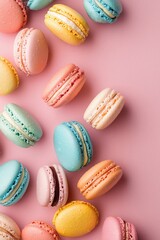 Colorful macaroons on a pastel background. Top view