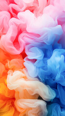 Fototapeta premium Colorful fabric swirls create a vibrant and dreamy abstract background.