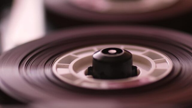 concept of wiretapping and recording conversations on magnetic tape, close-up audio cassette records overheard conversations of secret services
