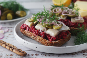 Scandinavian sandwiches with herring and beetroot