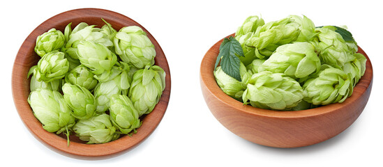 Fototapeta premium Hop cones in wooden bowl isolated on white background. Beer brewing ingredients. Beer brewery concept. clipping path