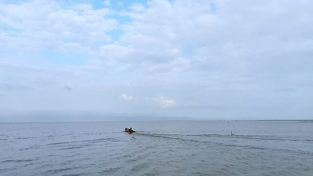 Small Boat is in the Middle of Lake