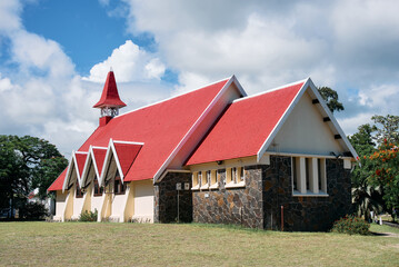Scenic landmarks of tropical Mauritius – the iconic red-roofed church on the beach at Cap...