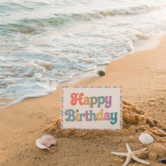 Tropical Beach Scene with Birthday Sign in Sand by the Ocean