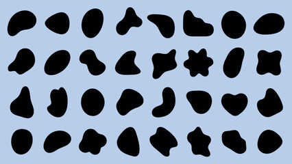 Fototapeta premium Abstract black shapes on a light blue background. Various shapes include circles, ovals, and irregular forms. Shapes create a modern, abstract pattern. Black shape vector set.