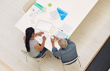 Startup, top view and people planning with phone, teamwork and renovation cost analysis. Writing...
