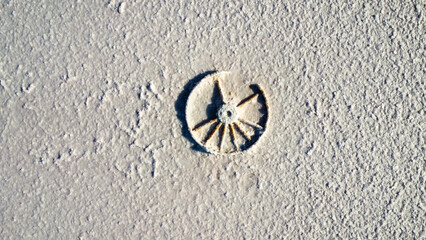 Sunk objects in a saltlake in the Australian outback, seen from above