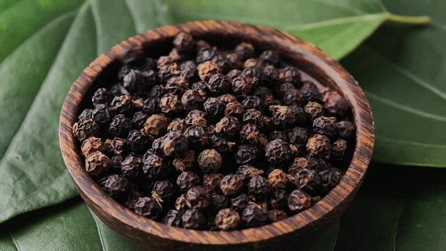 Dried peppercorn in a wooden bowl