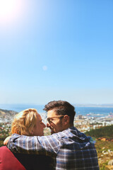Fototapeta premium Back, smile and love with couple in nature for bonding, park conservation date and mountain view. Happiness, holiday and peace with man and woman for vacation, commitment and kiss on mockup space