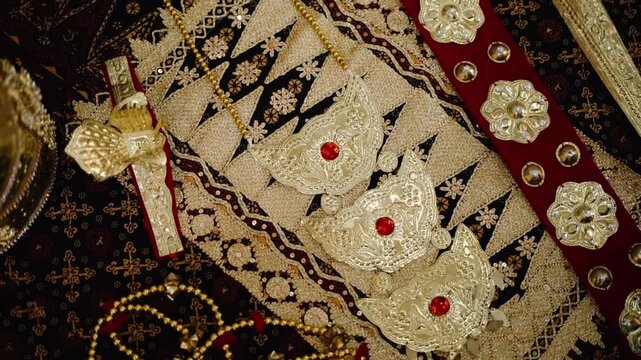 Lampung traditional clothing is very rich in gold ornaments and tapis cloth, which are typical characteristics of Indonesian Lampung culture