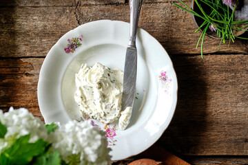 whipped chives butter. Serving, homemade loaf, side view.