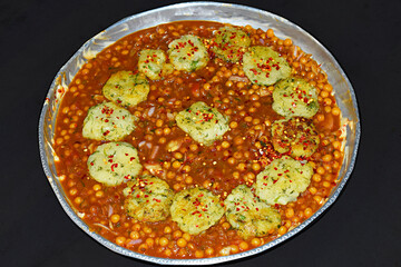 Aloo Tikki Chaat – A North Indian snack made of boiled potatoes and various spices, India.