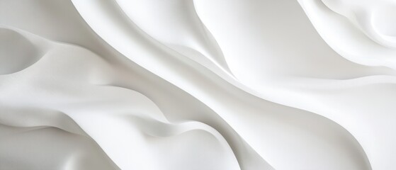 Obraz premium Textures of flowing white silk fabric, smooth curves and waves, elegant background for design, luxury fashion, or product display, light reflections and shadows.