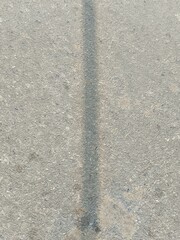 Fototapeta premium Dark Stain Mark on Rough Concrete Surface