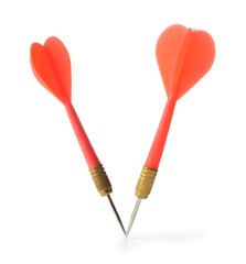 Red dart arrows in air isolated on white. Sports equipment