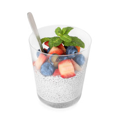 Delicious chia pudding with strawberries, blueberries and mint in glass isolated on white