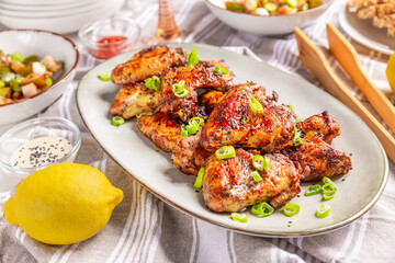 Picnic table and outdoor eating, chicken wings with mixed salad