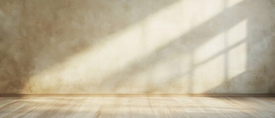 Sunlight streaming through a window onto an empty room with wooden floor and textured concrete walls, creating a serene and minimalist interior space.