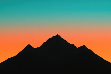 Silhouetted mountain peak against vibrant sunset sky, blending c