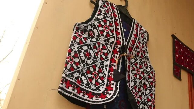 Traditional Pakistani Sindhi dresses, Traditional national dresses are on market in Peshawar city, Pakistan. Pashtun style. Pashtun fashion.
