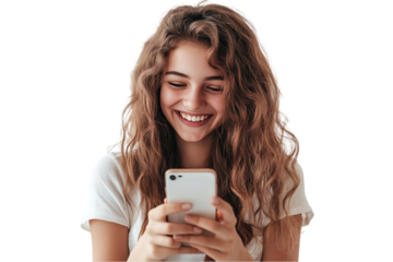 Happy woman laughs while using smartphone.