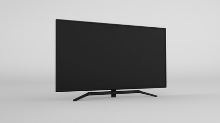 Modern flat-screen TV on stand, grey background.  Technology website use
