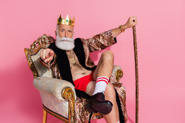 Photo of arrogant extravagant funny man in trendy king bathrobe choosing you as winner in poker...